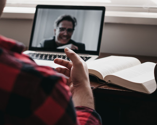 Mean speaking on a screen at a virtual job fair